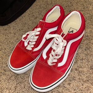 Red and white low top vans